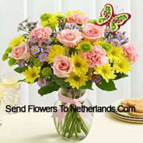 Pink Roses, Pink Carnations And Yellow Gerberas With Seasonal Fillers In A Glass Vase -- 25 Stems And Fillers