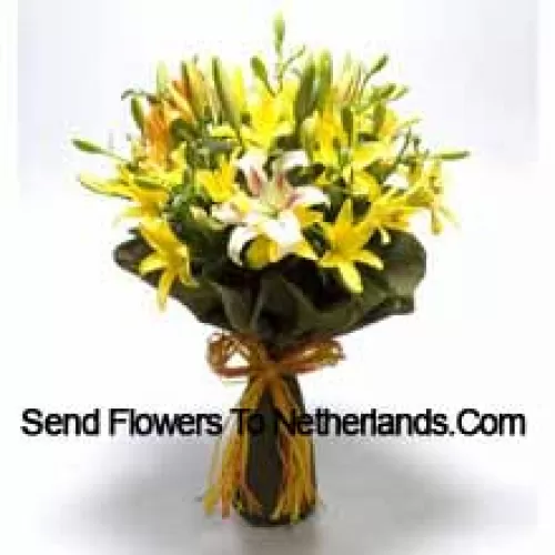 A Big Bunch Of Yellow And White Lilies With Seasonal Fillers