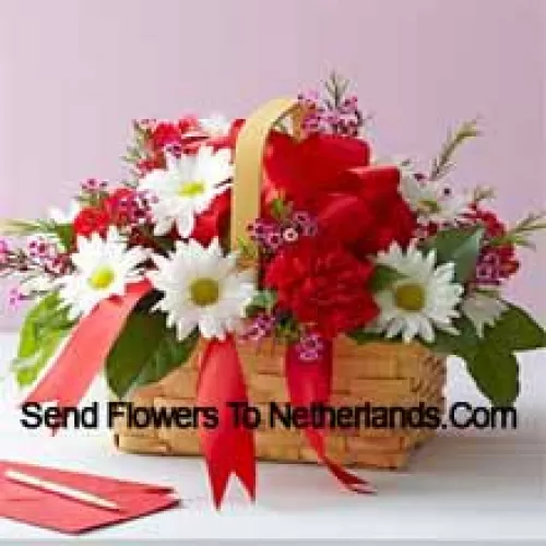 A Beautiful Arrangement Of White Gerberas And Red Carnations With Seasonal Fillers