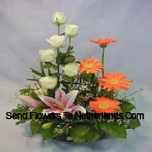 Basket Of Assorted Flowers Including Lilies, Roses And Daisies