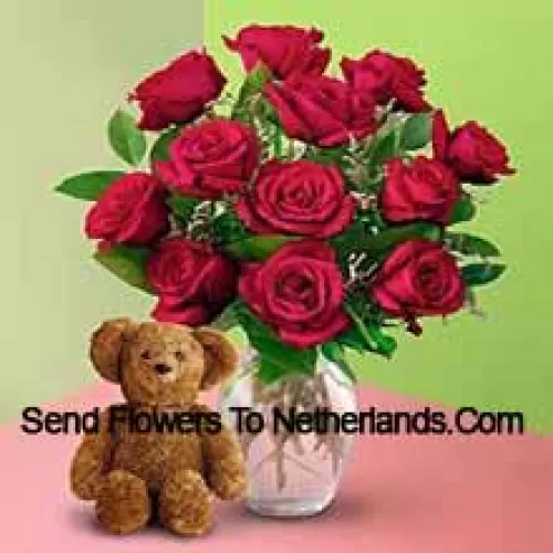 11 Red Roses With Some Ferns In A Vase And A Cute Brown 8 Inches Teddy Bear