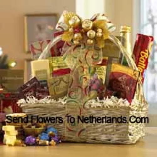 This gift basket shines for the holidays with a great selection of gourmet food for all. A shimmering basket holds Dutch Gouda Cheese Biscuits, Crantastic Snack Mix, Chocolate Cocoa, Scottish Shortbread Fingers, Roasted Peanuts, assorted Godiva Dark Chocolates, Smoky Cheddar, Fancy Water Crackers, Swedish Ballerina Cookies, Holiday Mints, Bellagio Caramella Coffee, Christmas Tea, and non-alcoholic Sparkling Apple Cider. It makes a nicely balanced selection of sweet and savory foods that are sure to please. (Please Note That We Reserve The Right To Substitute Any Product With A Suitable Product Of Equal Value In Case Of Non-Availability Of A Certain Product)